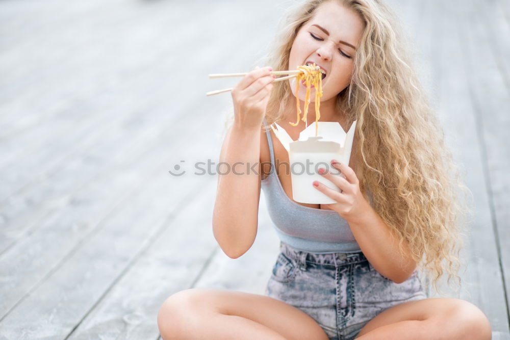 Similar – Young caucasian woman enjoying fresh juice