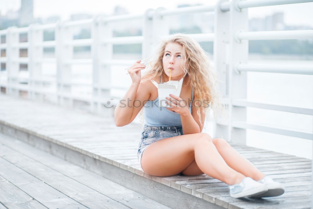 Similar – Portrait of a young fit beautiful healthy blonde woman posing