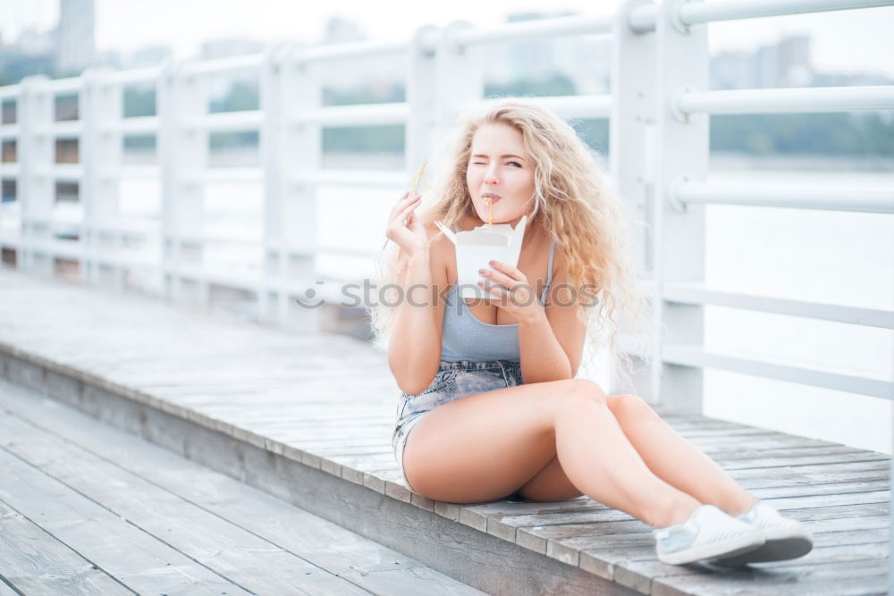 Similar – Image, Stock Photo Blond woman smiling sitting in urban steps