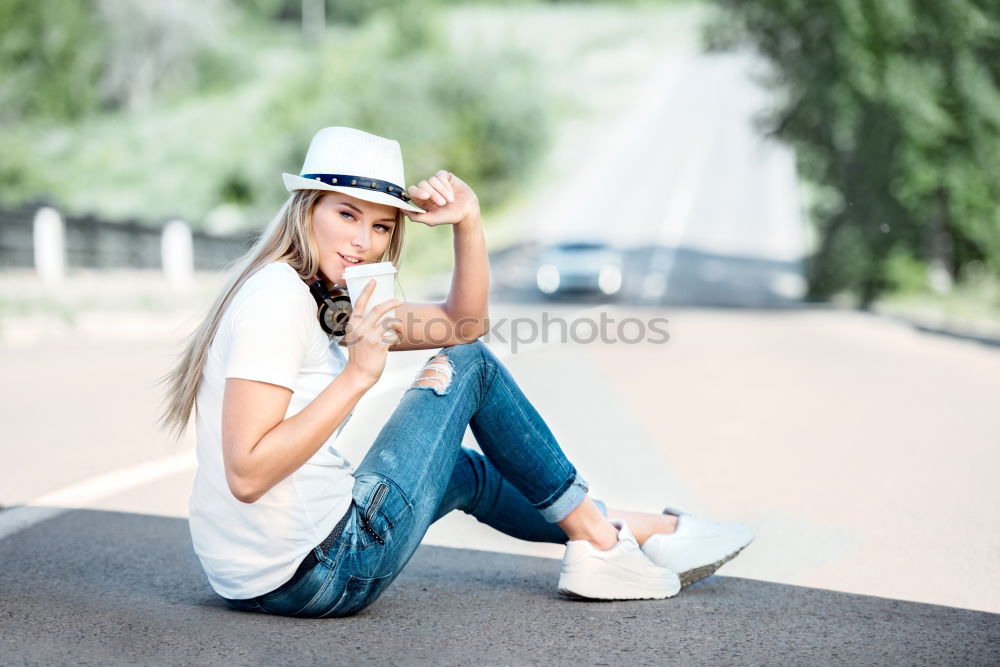 Similar – Beautiful young caucasian woman smiling outdoors