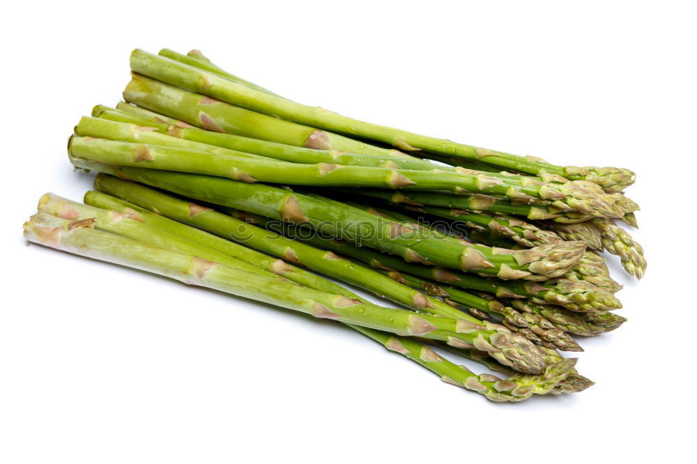 Similar – Image, Stock Photo Portion of asparagus bunch with green, fresh, juicy asparagus, from fresh, local harvest, lies in heaps, bundles on a white cloth made of linen.