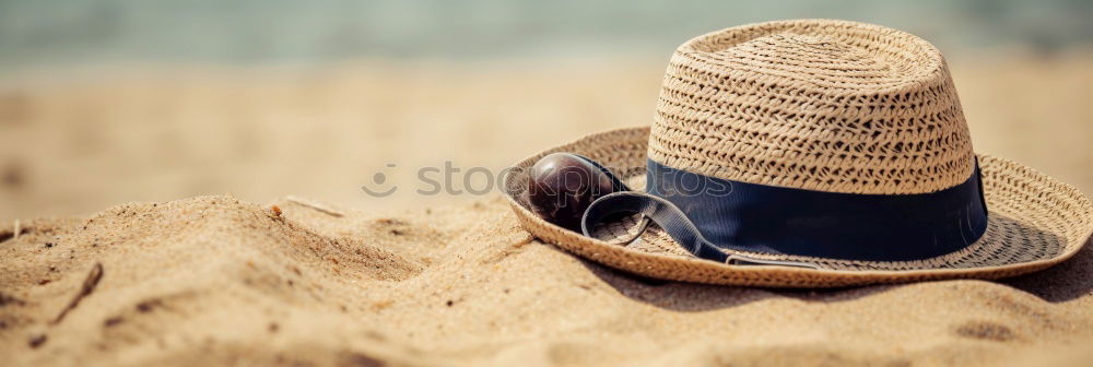 Similar – Image, Stock Photo Towel, floats, water gun and sunscreen on the beach