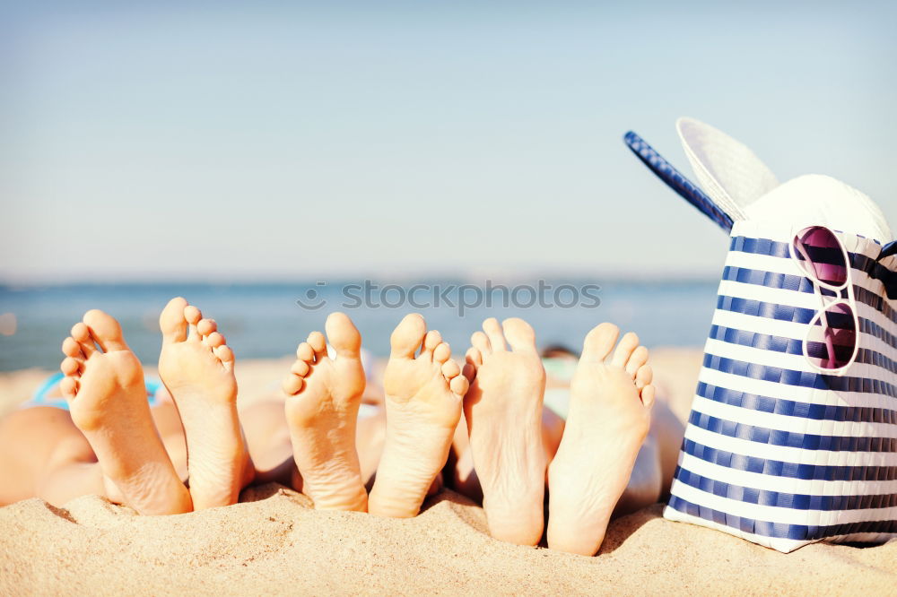 Similar – Father and son playing on the beach at the day time. They are dressed in sailor’s vests and pirate costumes. Concept of happy game on vacation and friendly family.