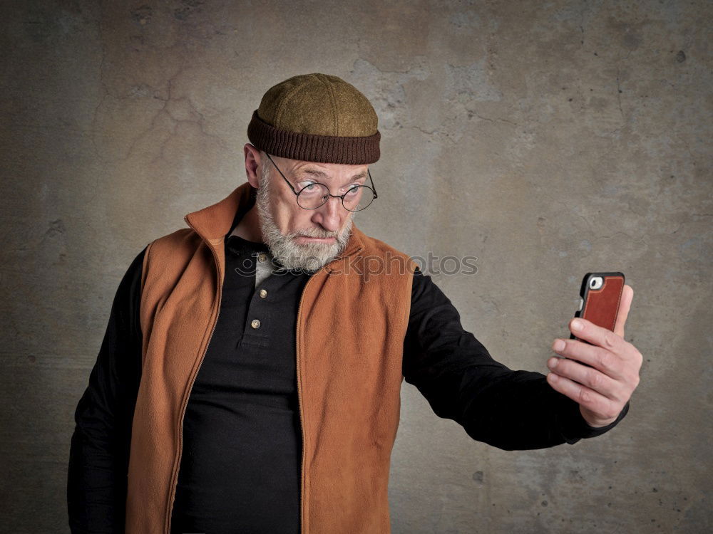 Similar – Image, Stock Photo Senior citizen with smartphone in the woods