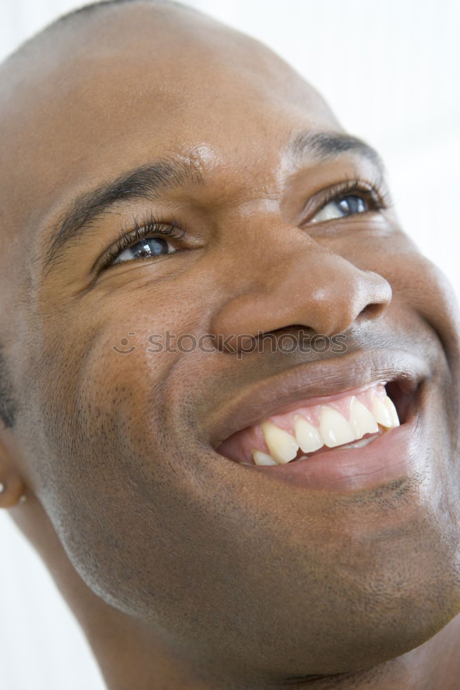 Similar – Young handsome black man holds a ice cream cone