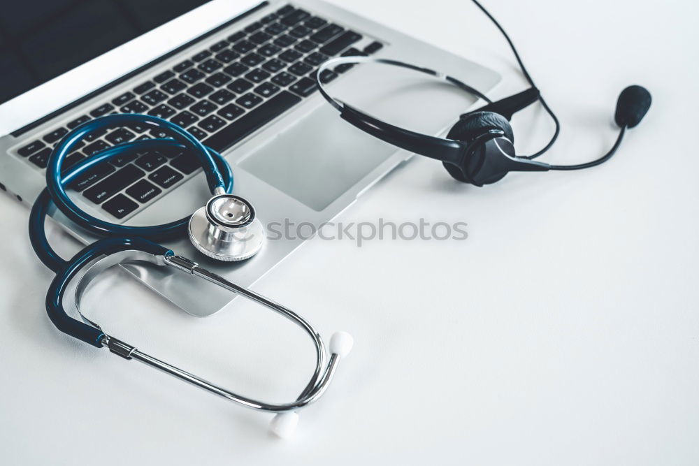 Similar – Image, Stock Photo Doctor’s stethoscope and laptop on table