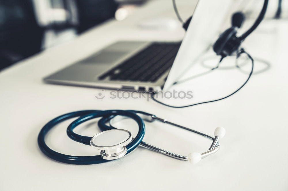 Image, Stock Photo Doctor’s stethoscope and laptop on table