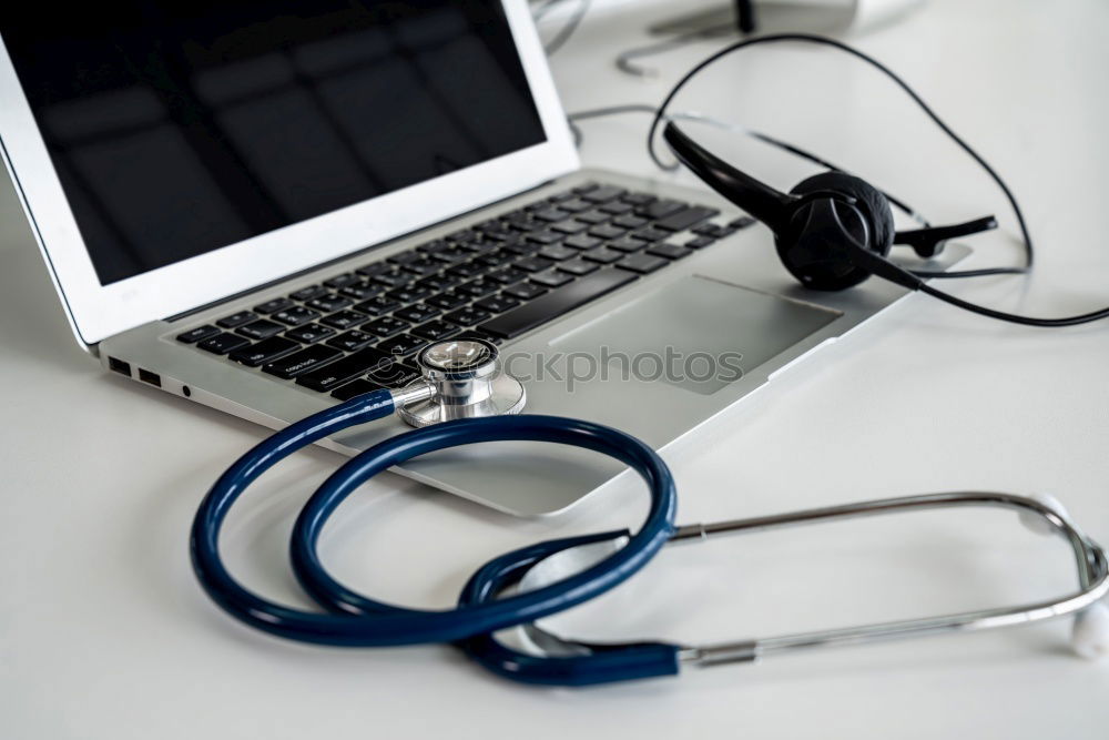 Similar – Image, Stock Photo Doctor’s stethoscope and laptop on table