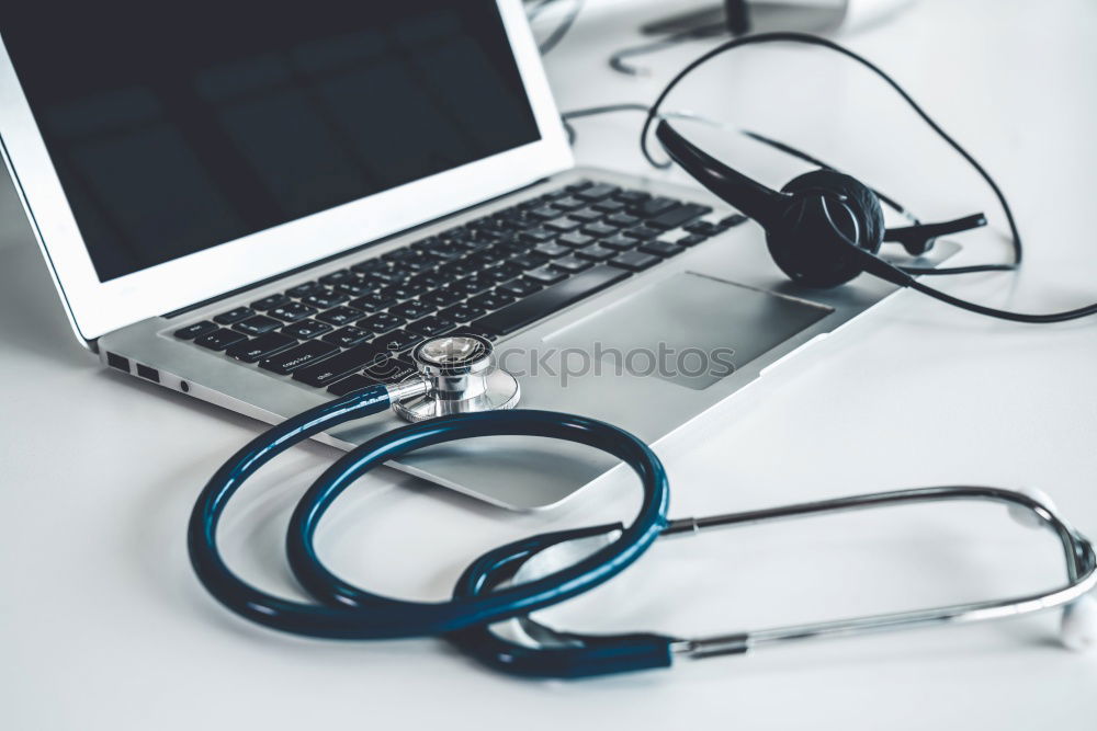 Image, Stock Photo Doctor’s stethoscope and laptop on table