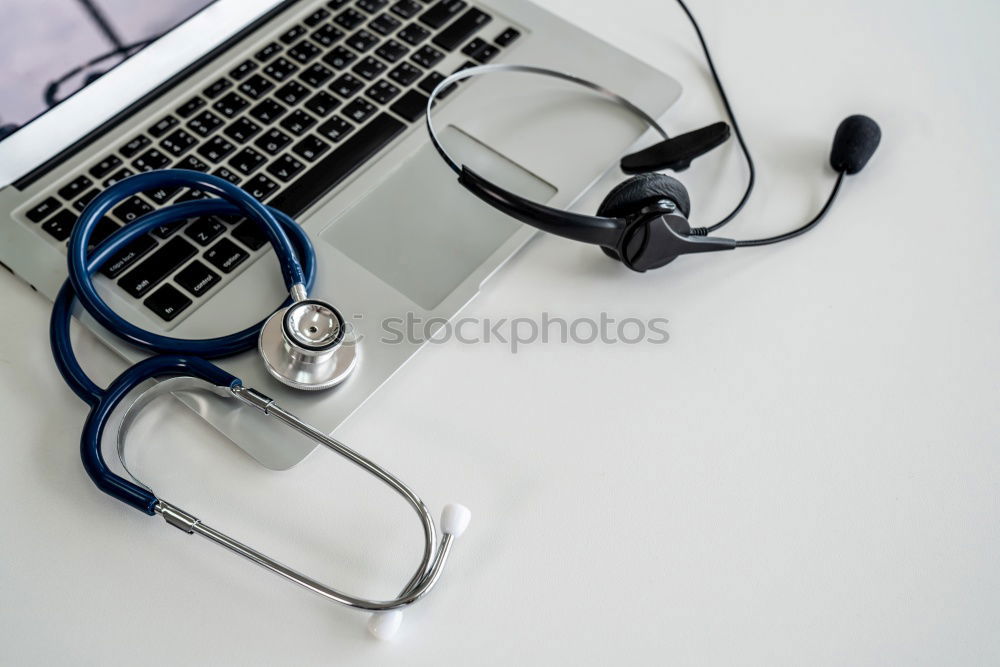 Similar – Image, Stock Photo Doctor’s stethoscope and laptop on table