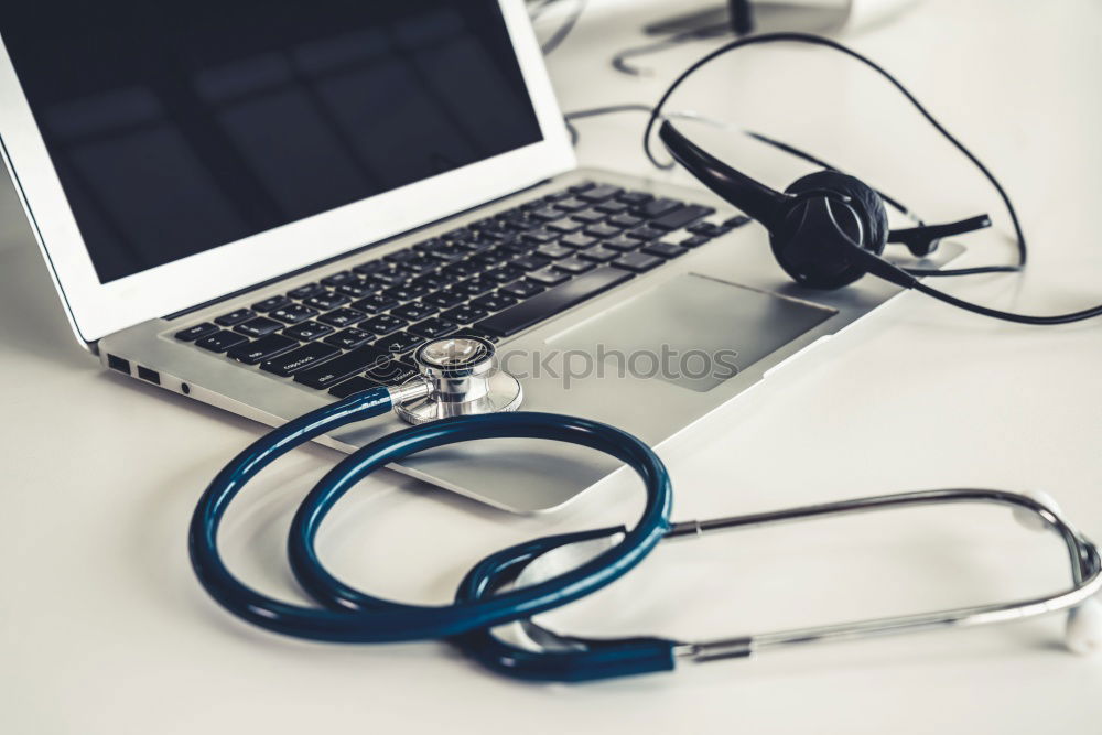 Similar – Image, Stock Photo Doctor’s stethoscope and laptop on table