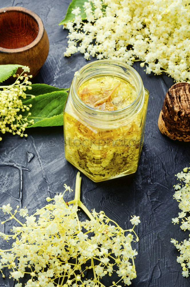 Similar – Image, Stock Photo Jar with Linden blossom on wooden table