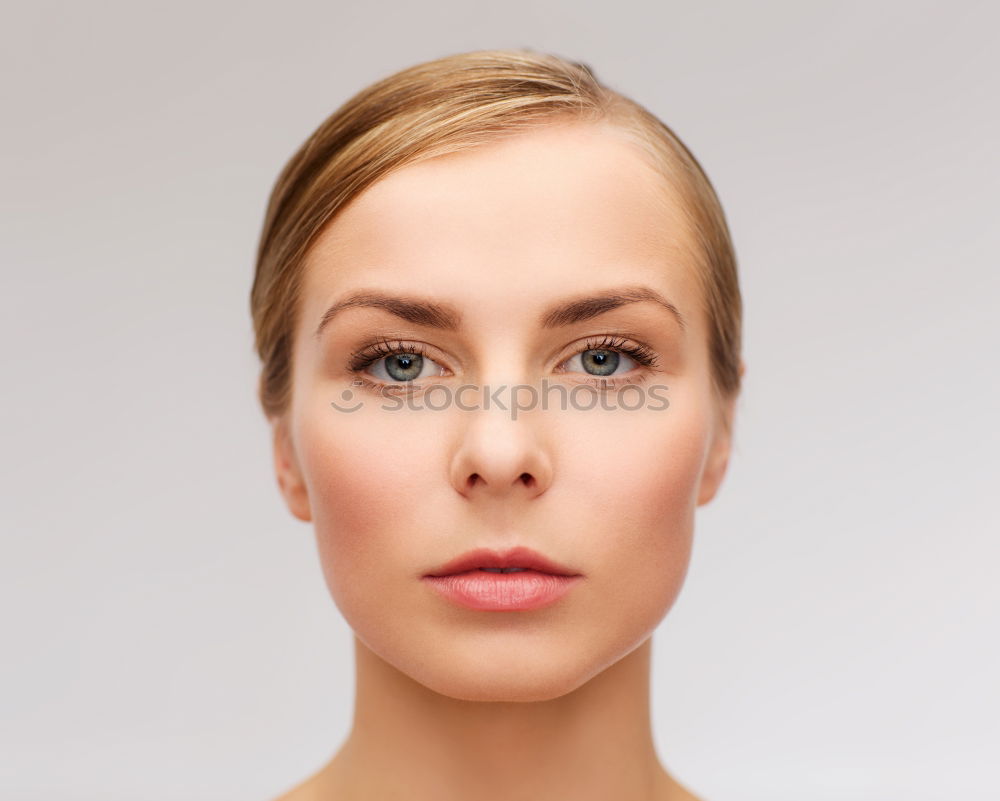 Similar – Image, Stock Photo Young woman with freckles and short blonde hair looks sideways at camera