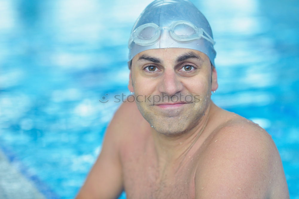 Similar – Young handsome man posing near a pool