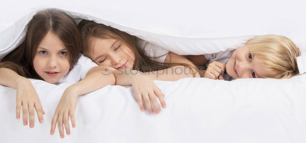 Similar – Image, Stock Photo two young beautiful kids resting on bed