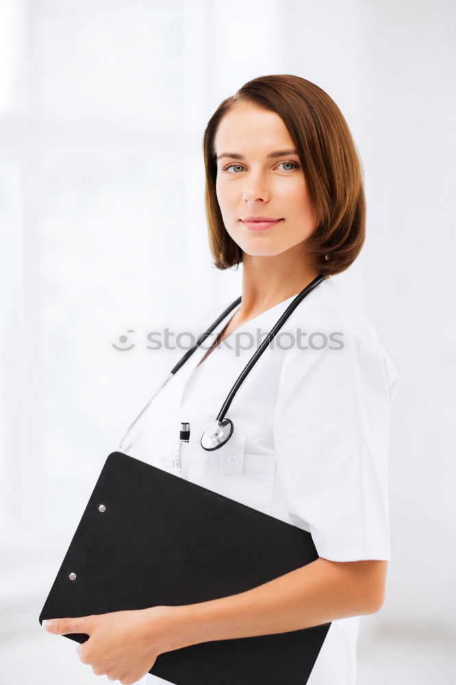 Similar – Female cosmetician applying a facial mask with special cosmetic brush. Beautiful cosmetician looking to the camera