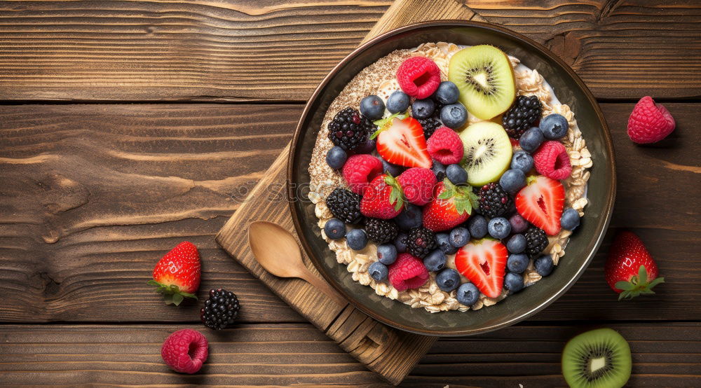 Similar – Oat flakes with berries and spoon