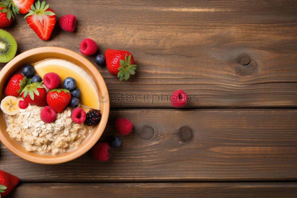 Similar – Oat flakes with berries and spoon