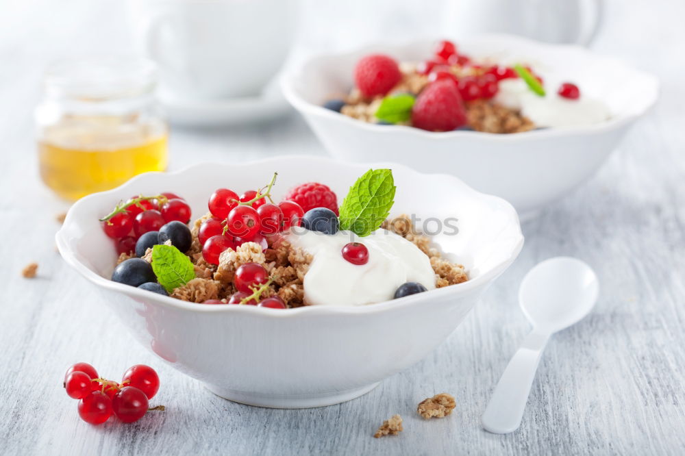 Similar – Image, Stock Photo Muesli with yoghurt and fruits on wood