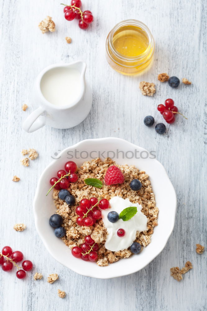 Similar – Image, Stock Photo Muesli with yoghurt and fruits on wood