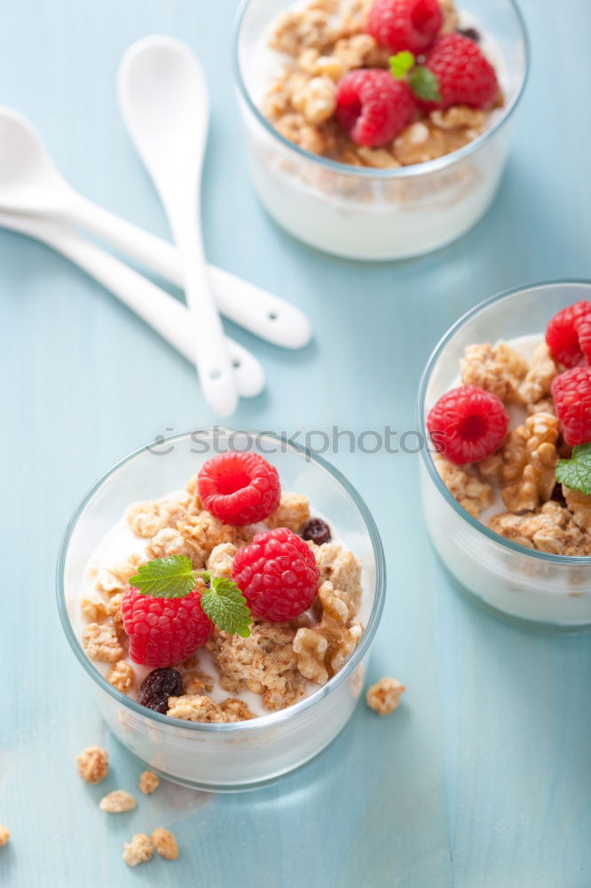 Similar – Chia yogurt with raspberries in a glass cup