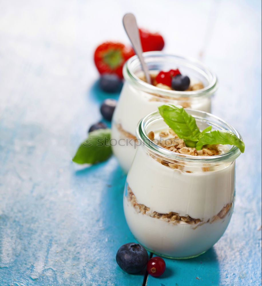 Similar – Chia yogurt with raspberries in a glass cup