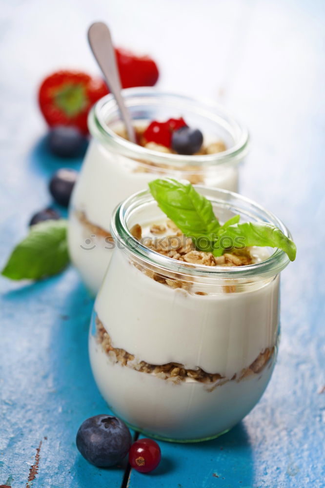 Similar – Image, Stock Photo Muesli with yoghurt and fruits on wood