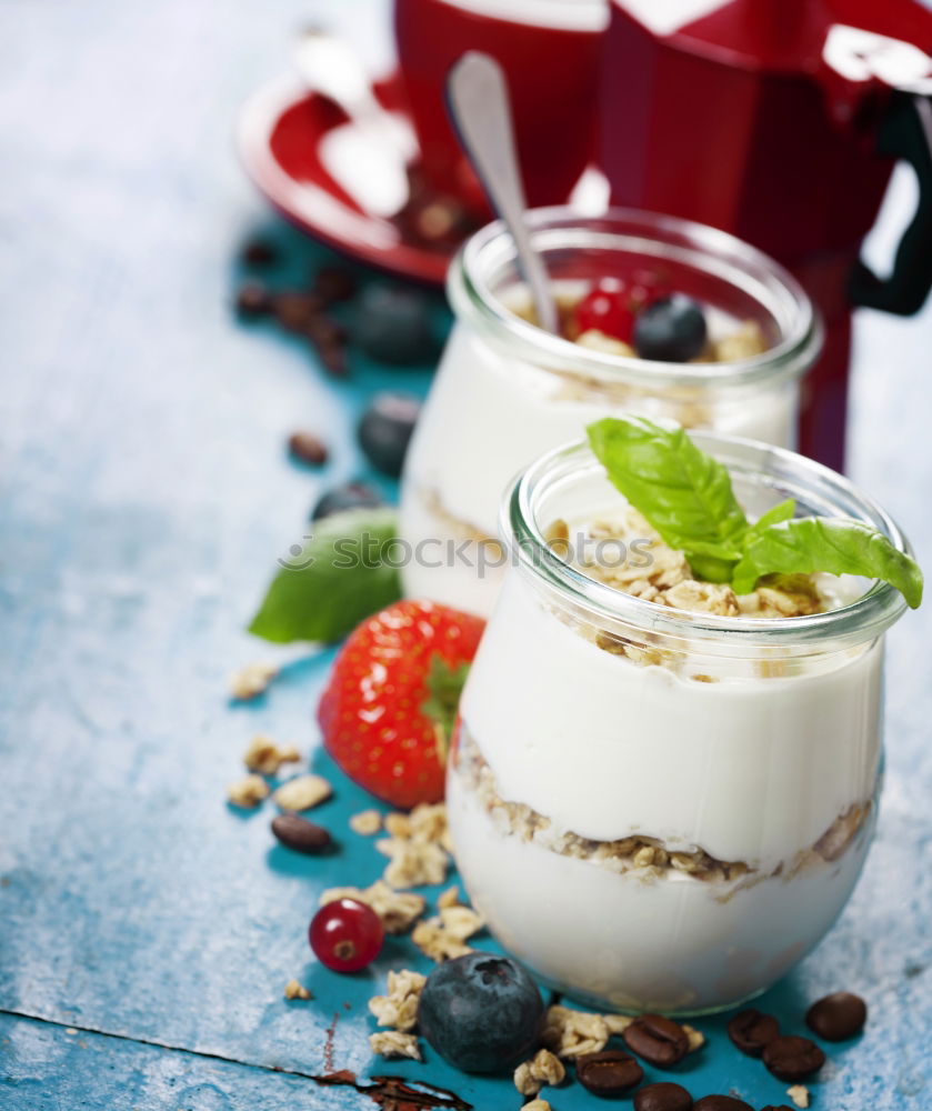 Similar – Image, Stock Photo Muesli with yoghurt and fruits on wood