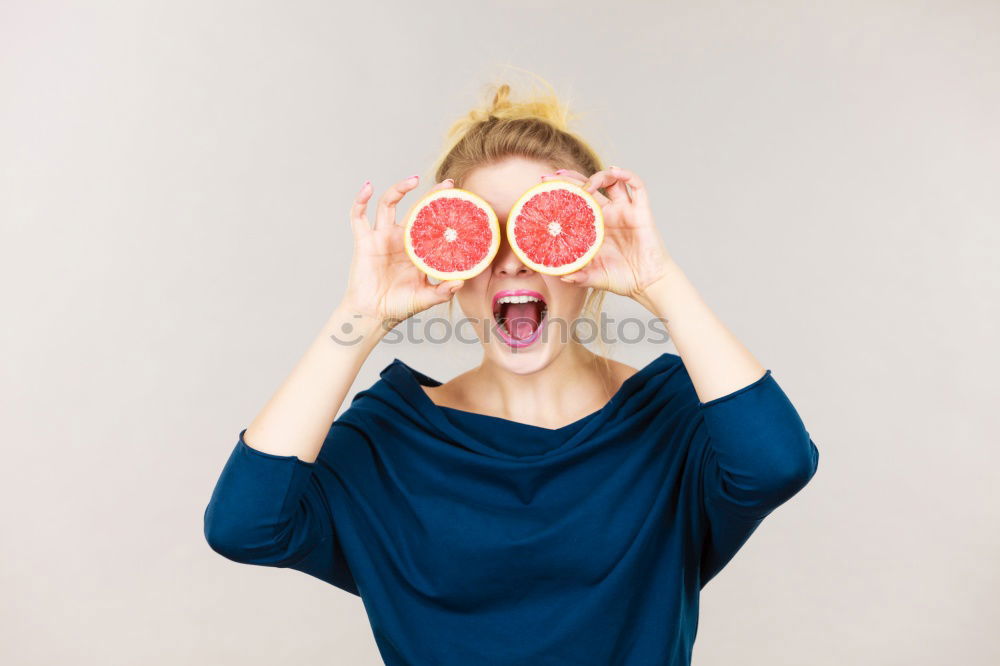 Similar – Not so young but happy Caucasian woman chewing watermelon