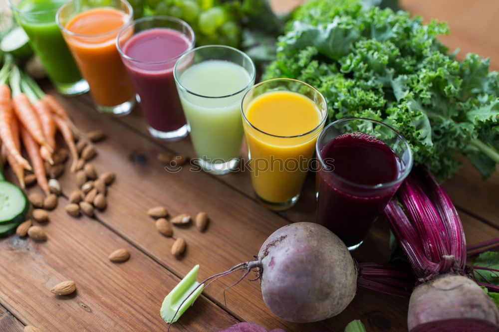 Similar – Juice in a mug on a gray wooden surface