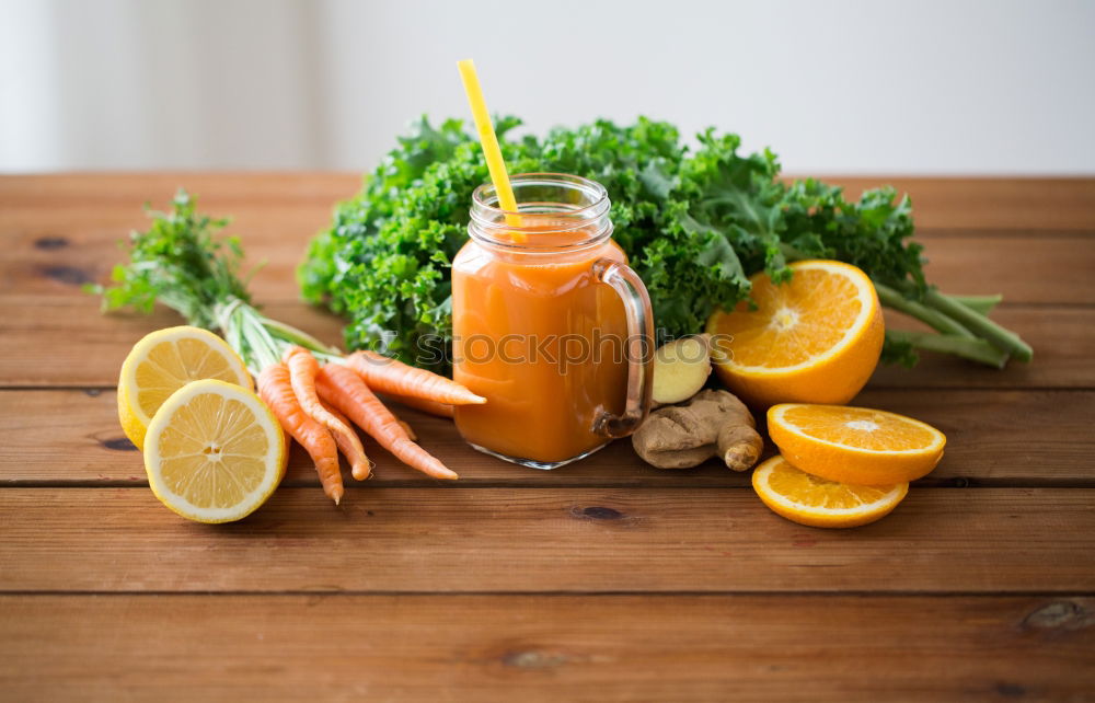 Similar – Carrot juice in glass jars and iron mug