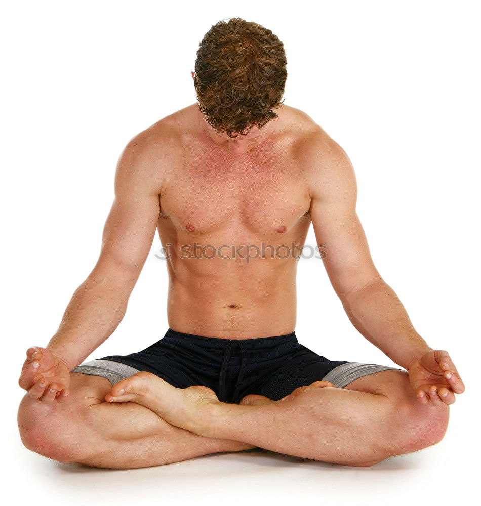 Similar – Anonymous man meditating during yoga training