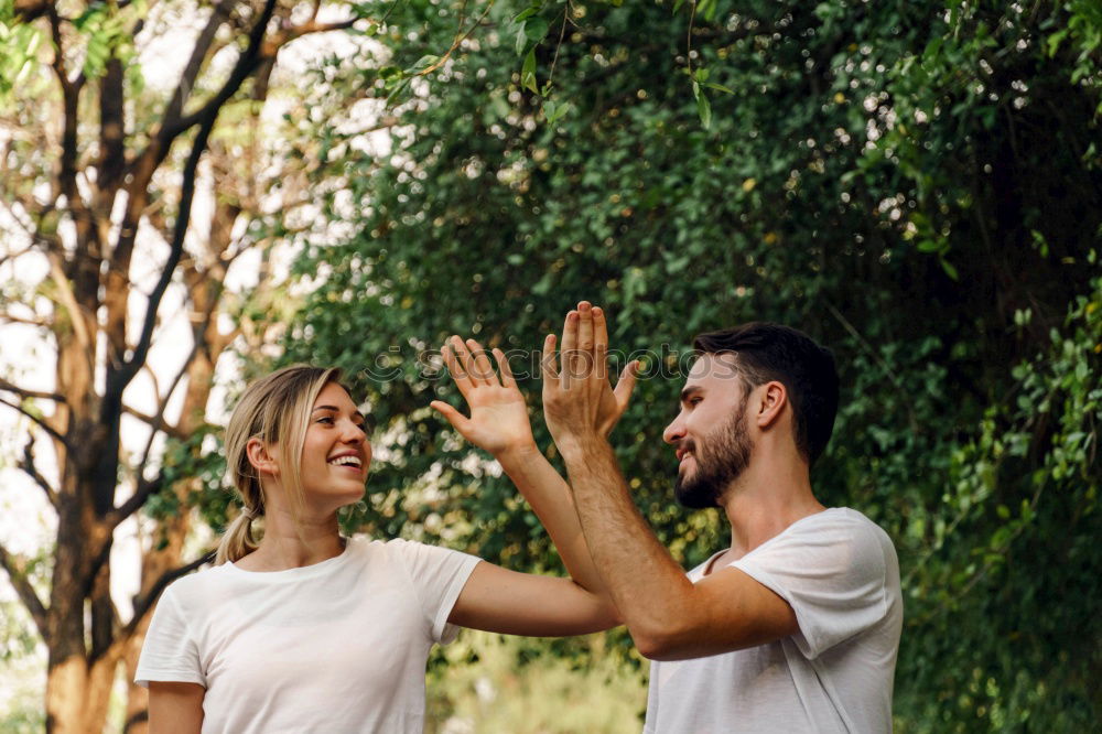 Similar – Smiling bearded man giving a piggy back to his girlfriend.