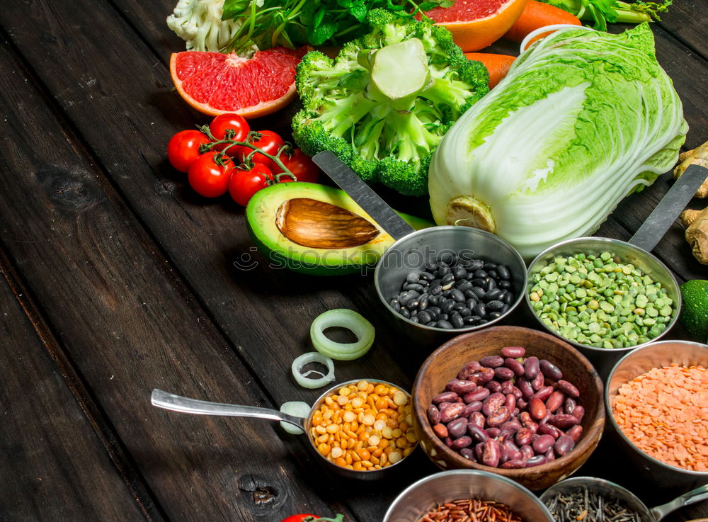 Similar – Image, Stock Photo Lentils with fresh vegetables and ingredients for cooking