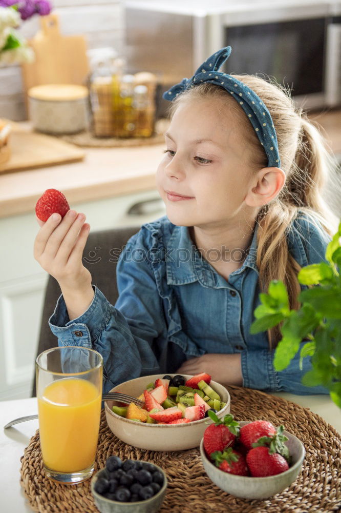 Similar – Image, Stock Photo child girl helps mom to cook