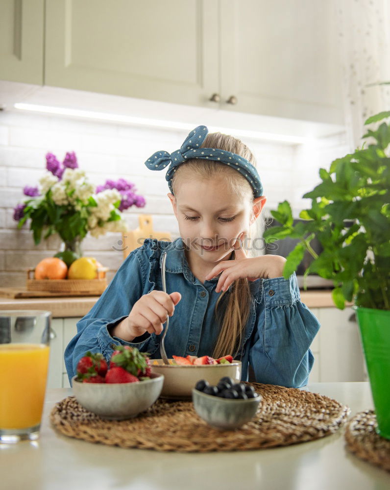 Similar – Image, Stock Photo child girl helps mom to cook