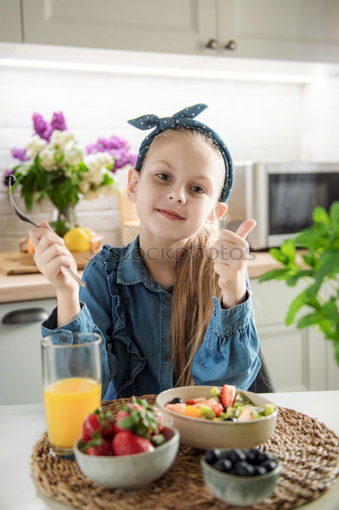 Similar – Image, Stock Photo child girl helps mom to cook