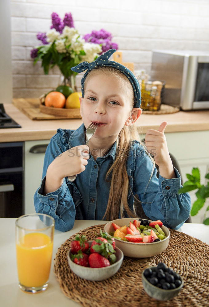 Similar – Image, Stock Photo child girl helps mom to cook