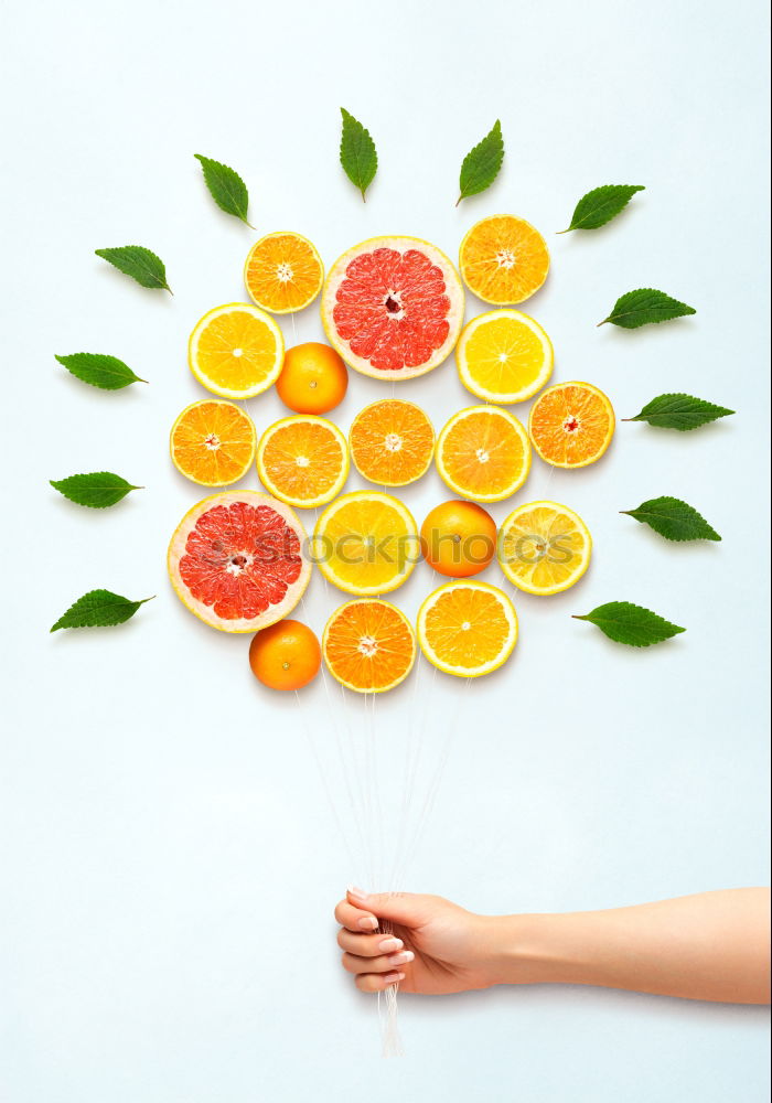 Similar – Image, Stock Photo Slices of citrus on round plate