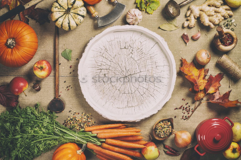 Similar – Ingredients for healthy soup or vegetables stew with orange color vegetarian ingredients : pumpkin, carrots, sweet potatoes , turmeric, ginger and chili on kitchen table background, top view.