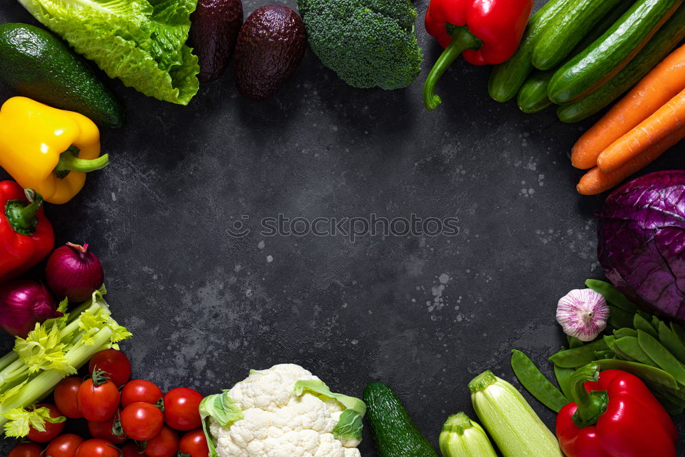 Similar – Vegetables and utensils on kitchen table