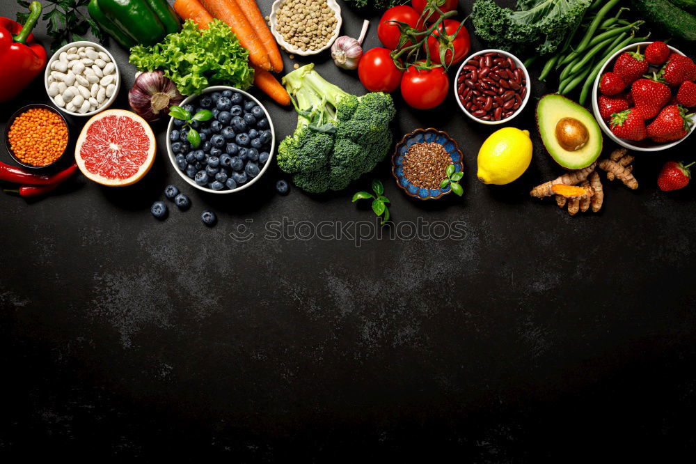 Similar – Vegetables and utensils on kitchen table