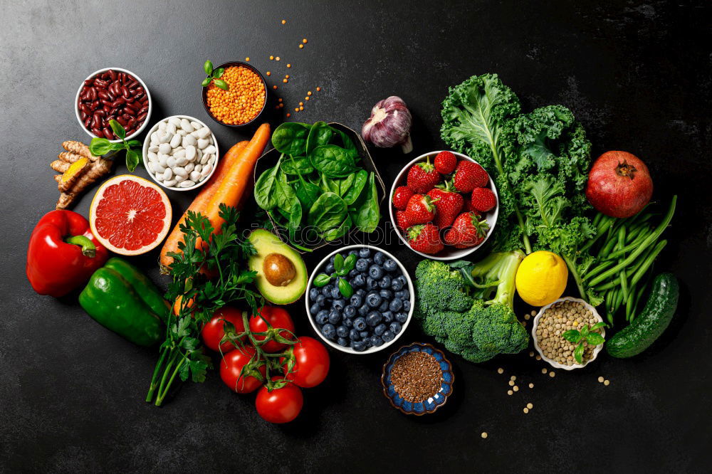 Similar – Vegetables and utensils on kitchen table