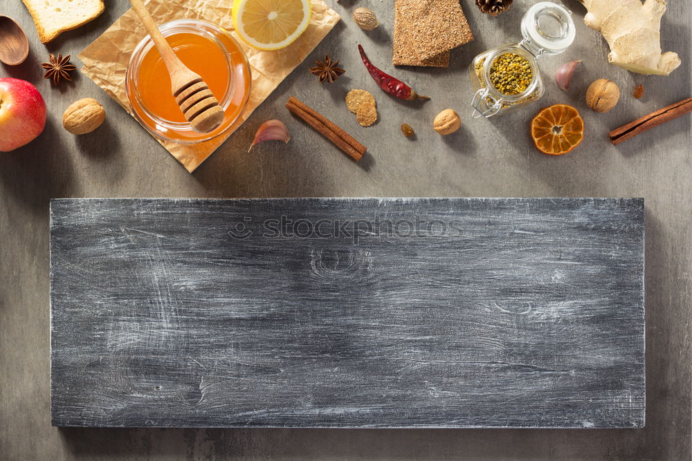 Similar – process of slicing fresh carrots on a chopping board