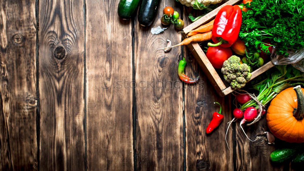 Similar – Image, Stock Photo Fresh raw vegetables and spices on gray wooden surface