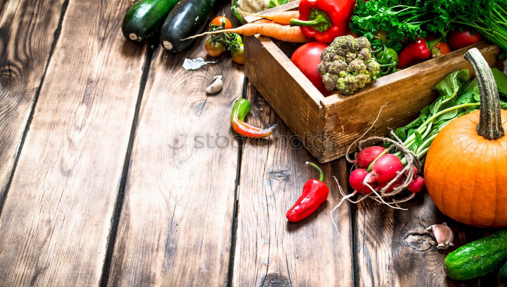 Vegetables and utensils on kitchen table