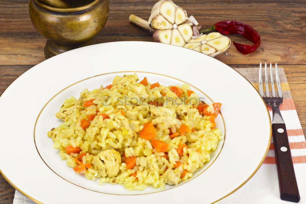 Image, Stock Photo Risotto with vegetables on a wooden table