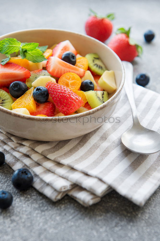 Similar – Acai bowl strawberry blueberry banana wooden table