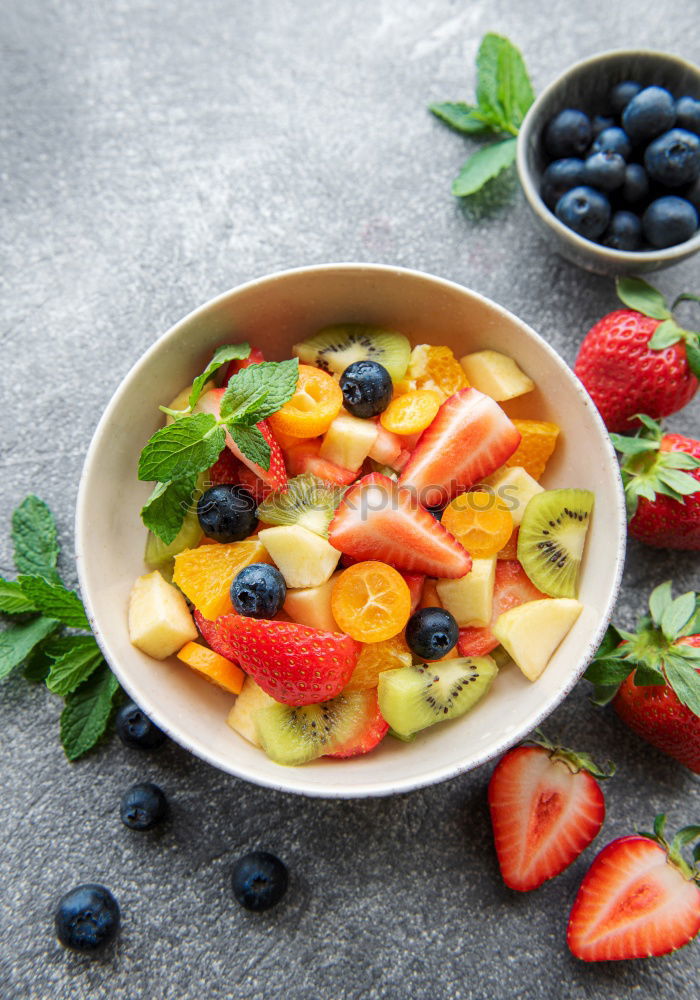 Similar – Acai bowl strawberry blueberry banana wooden table