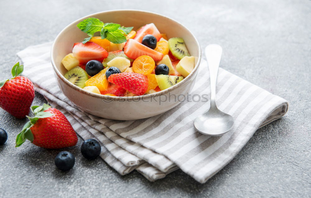 Similar – Acai bowl strawberry blueberry banana wooden table